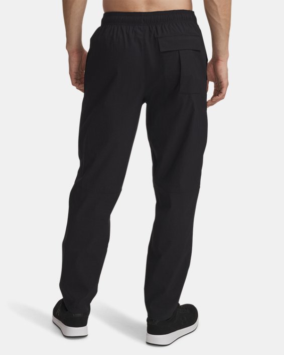 UA MOTION TAPERED MEN'S TROUSERS